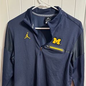 Jordan Michigan Wolverine’s Dri-FIT Dark Blue Apparel